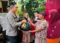 Bantu Warga, Polres Depok Bagikan 500 Paket Sembako Di Slum Area
